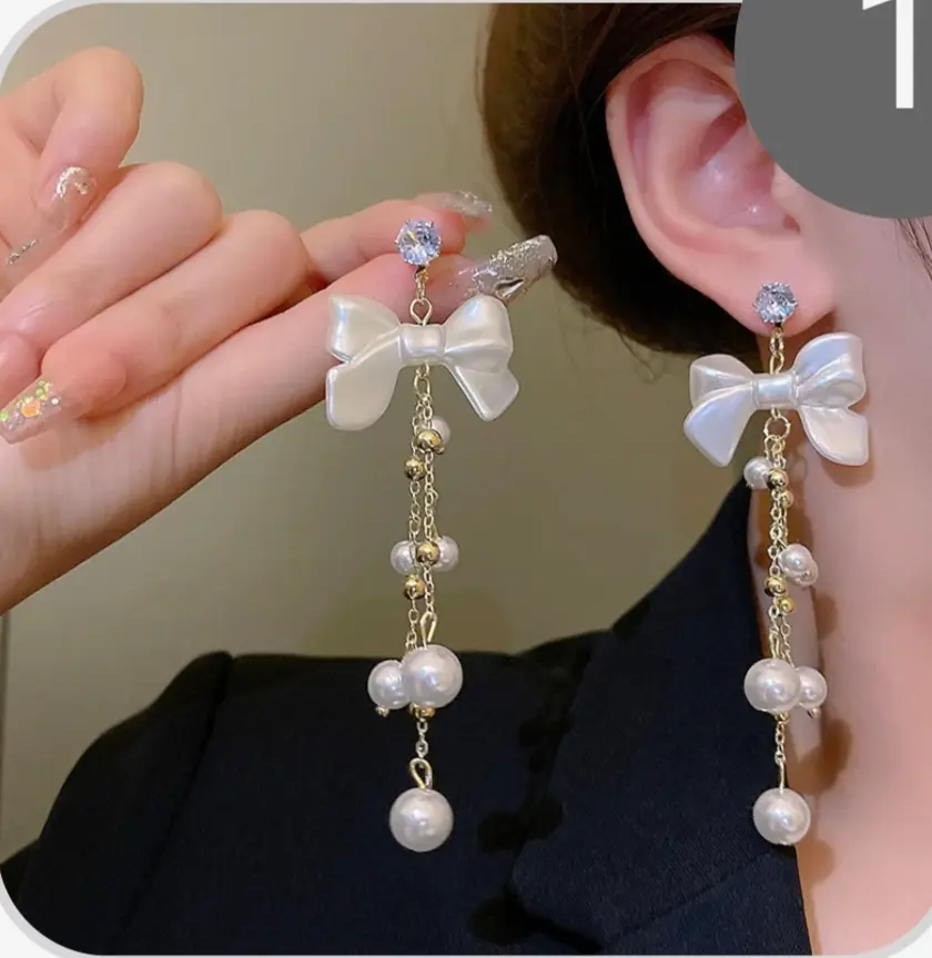 Retro long bow pearl tassel earrings